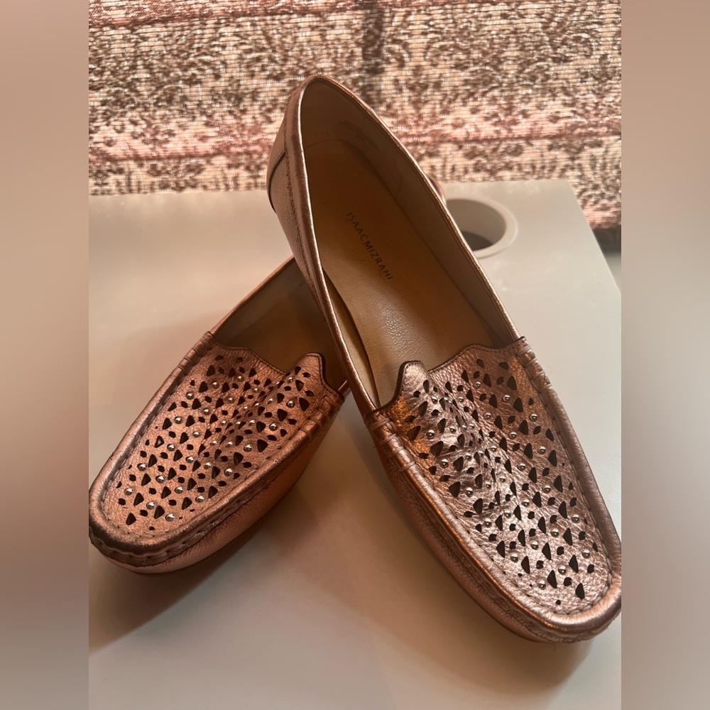 Rose gold loafers with silver embellishments